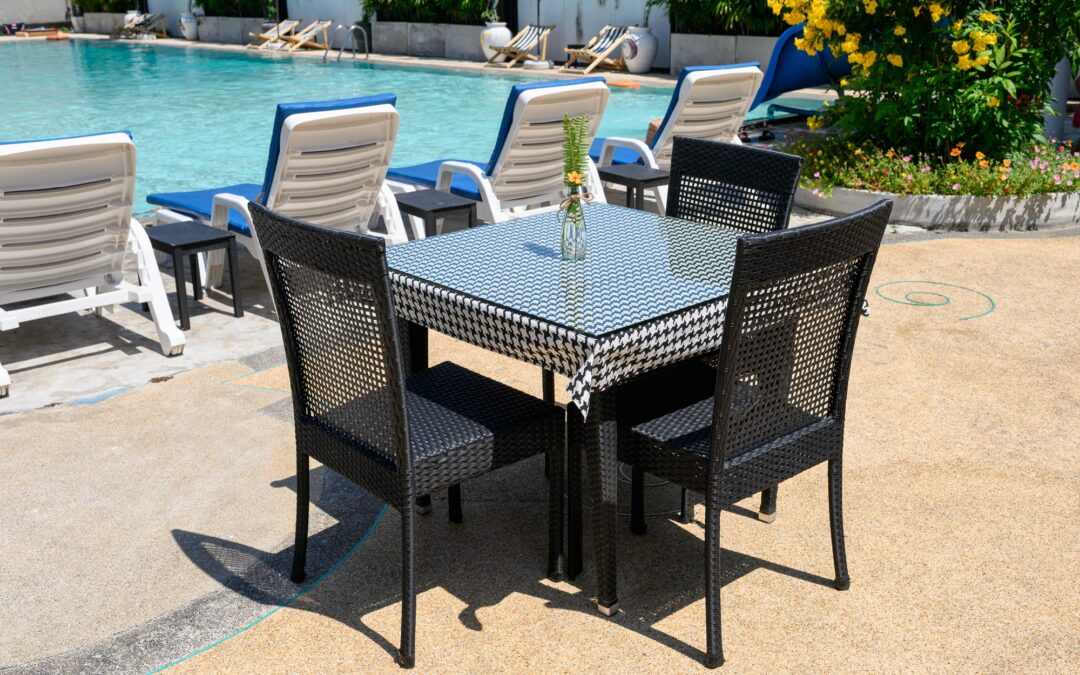 Table and chairs with swimming pool